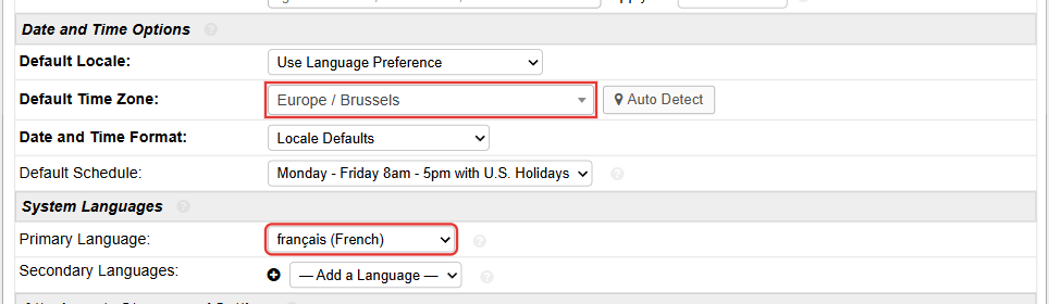 Paramètres système encore en anglais : Default Time Zone vaut Europe / Brussels et Primary Language vaut français (French)